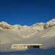 Rifugio Vittorio Sella mountain lodge in Cogne in winter